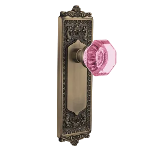 Egg & Dart Long Plate with Pink Waldorf Knob in Antique Brass