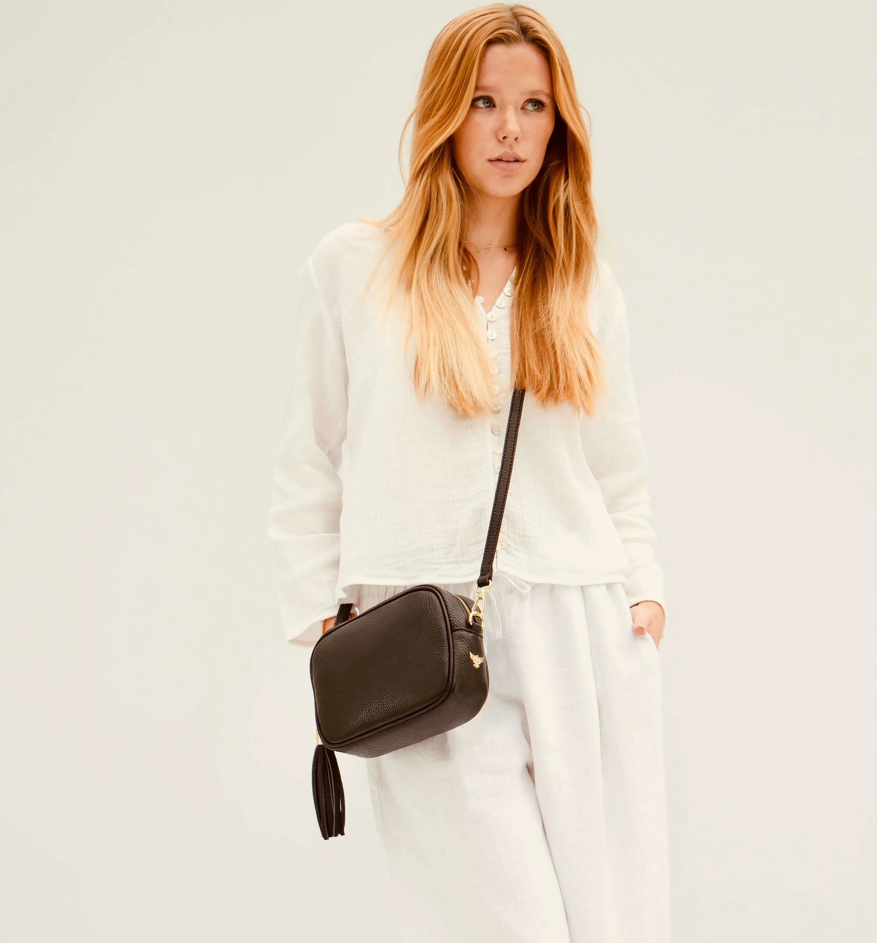 The Tassel Black Leather Crossbody Bag With Midnight Zigzag Strap