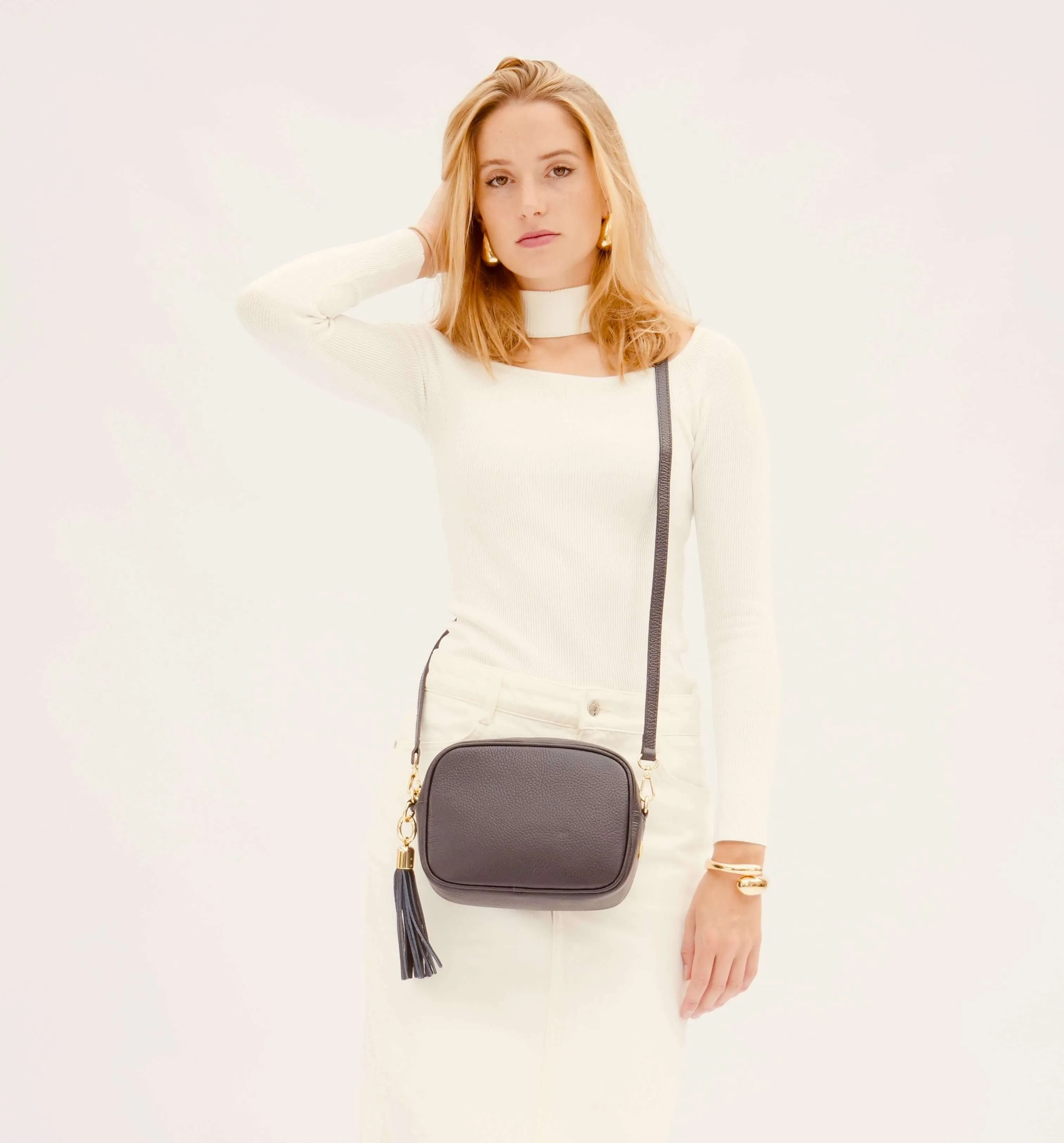 The Tassel Navy Leather Crossbody Bag With Grey Leopard Strap