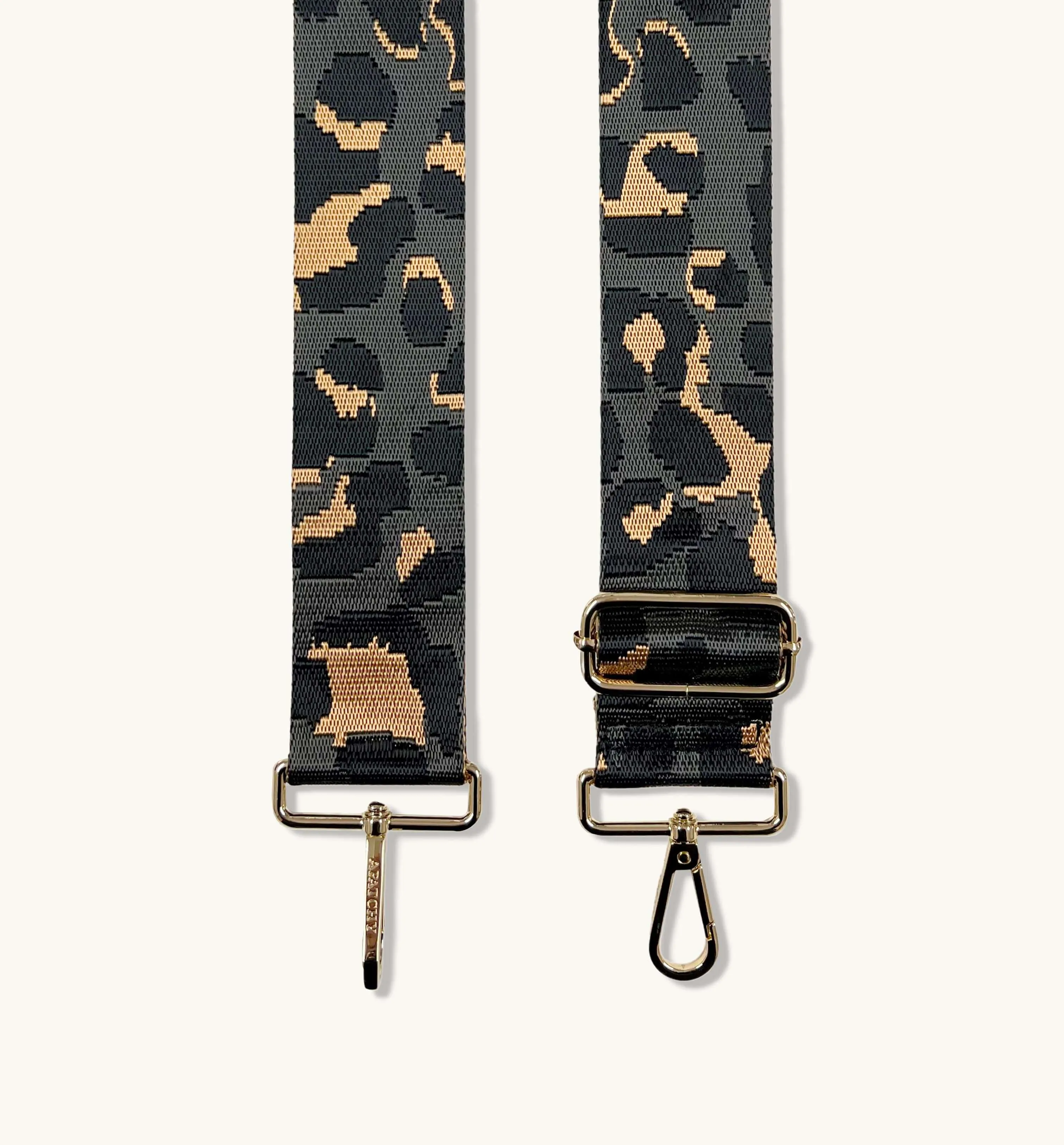 The Tassel Navy Leather Crossbody Bag With Grey Leopard Strap