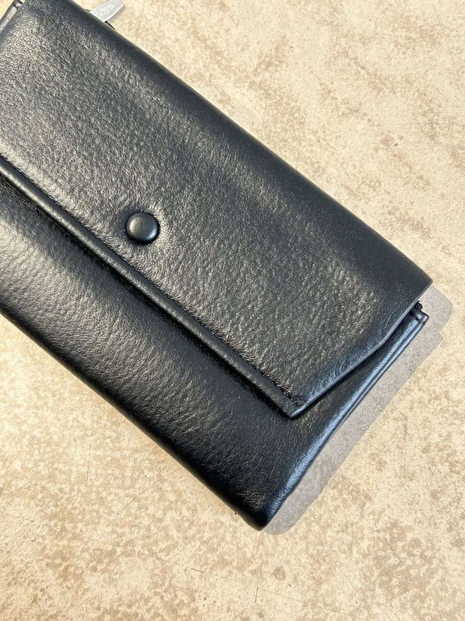 Wallet with button